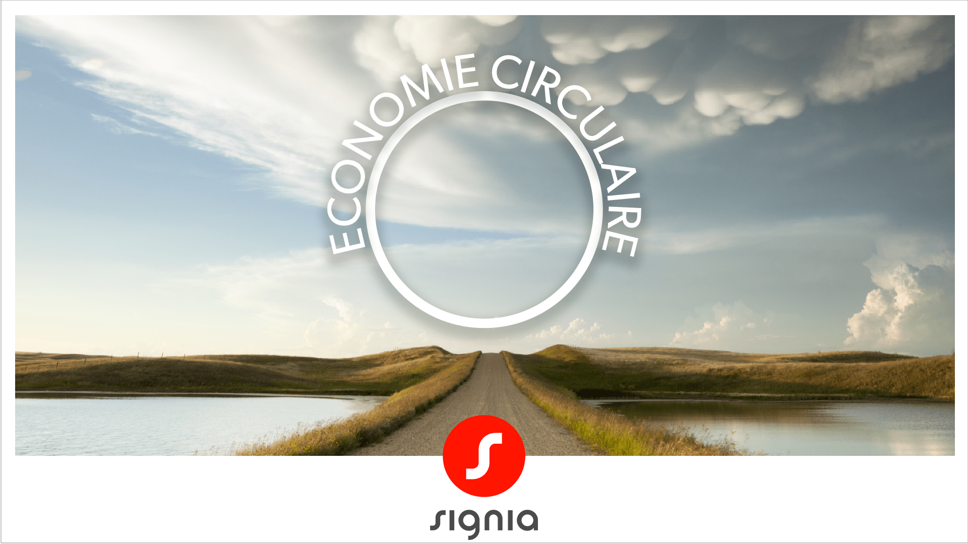 Paysage comportant un lac traversé d'une route - communiqué de presse RSE Signia