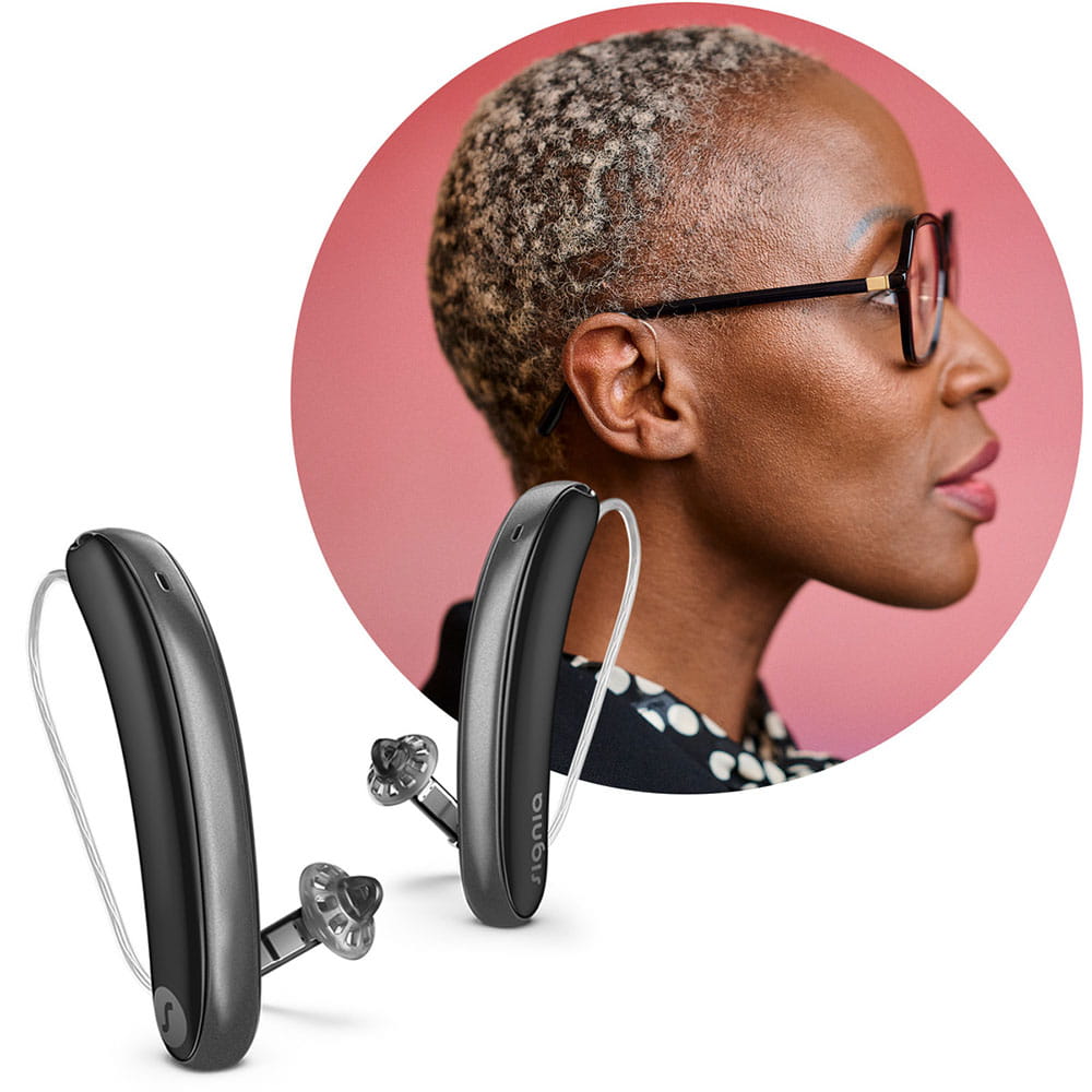 Portrait of a woman wearing Styletto IX hearing aids