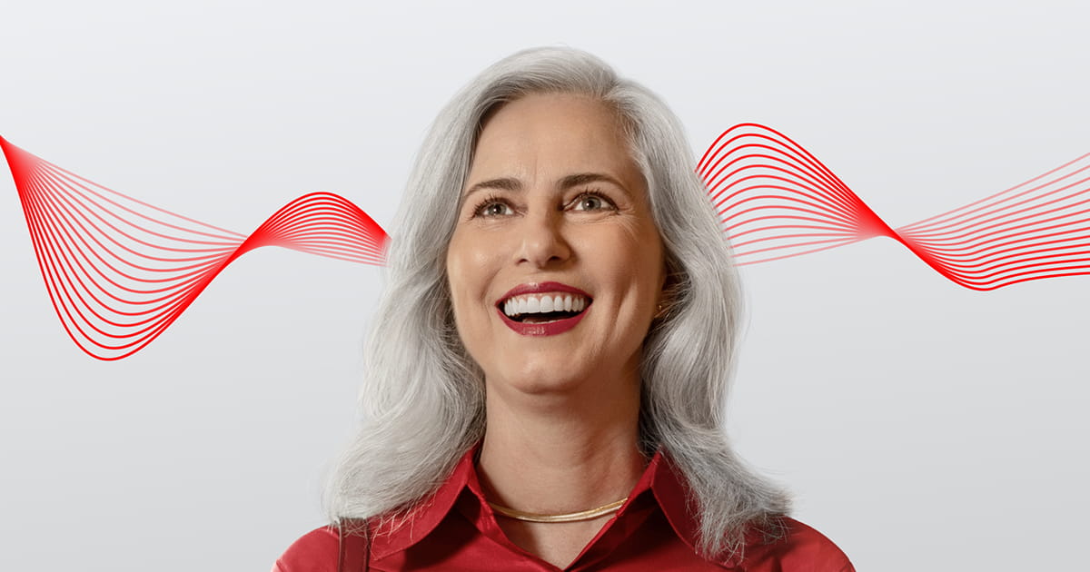 woman laughing with Signia wave